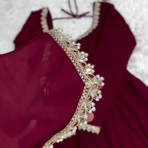 Women’s Elegant Maroon Anarkali-Style Ethnic Dress with Decorative Border | Graceful Long-Sleeve Festive Outfit
