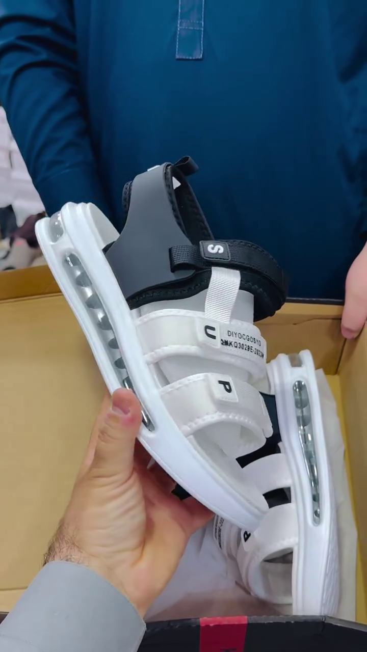 Sporty White & Black Sandals – Modern Style with a Statement Sole