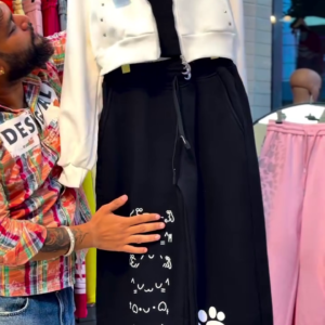 Women’s Trendy Black Casual Co-Ord Set with White Sleeveless Cropped Vest Jacket, Printed Cat & Paw Graphic Wide-Leg Trousers, Adjustable Drawstring Waist and Playful Streetwear Styling