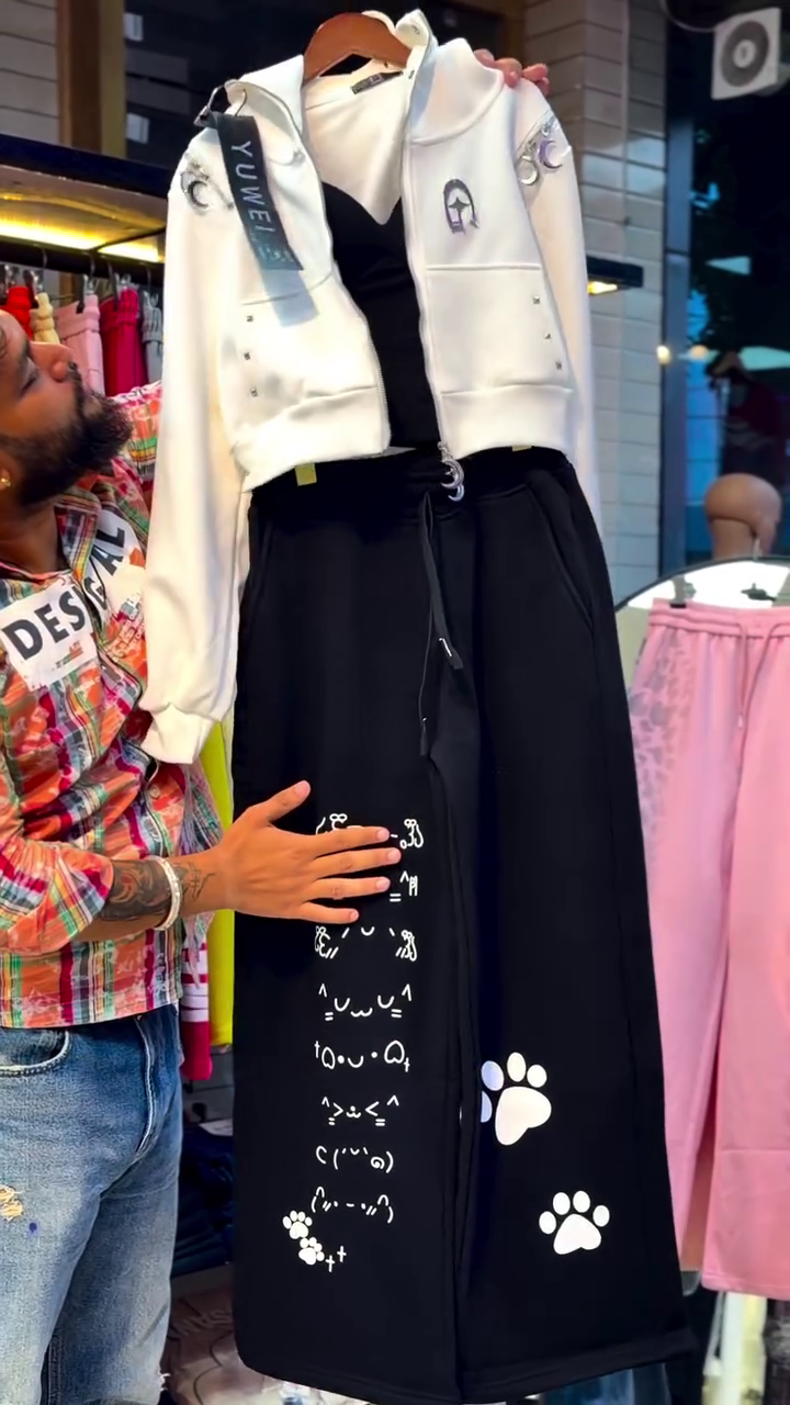 Women’s Trendy Black Casual Co-Ord Set with White Sleeveless Cropped Vest Jacket, Printed Cat & Paw Graphic Wide-Leg Trousers, Adjustable Drawstring Waist and Playful Streetwear Styling