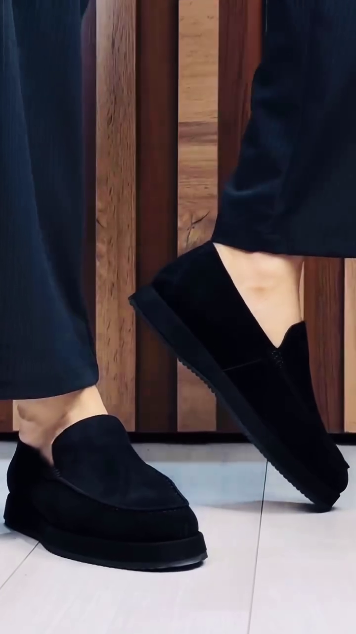 Unisex Minimalist Black Slip-On Platform Loafers with Rounded Almond Toe, Smooth Monochrome Finish, Raised Chunky Sole, Low-Profile Slip-On Construction and Modern Casual Formal Styling