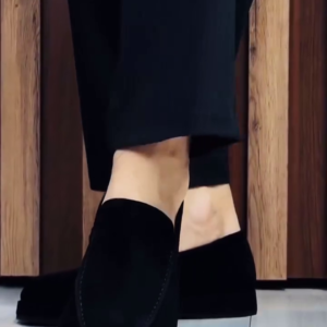 Unisex Minimalist Black Slip-On Platform Loafers with Rounded Almond Toe, Smooth Monochrome Finish, Raised Chunky Sole, Low-Profile Slip-On Construction and Modern Casual Formal Styling