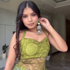 💚✨ Designer Olive Green Indo-Western Lehenga Set with Embellished Crop Blouse, Sheer Printed Dupatta-Style Overlay, Decorative Mirror-Style Border, Colourful Trim and Traditional Tassel Accents – Festive Party Wear Ensemble